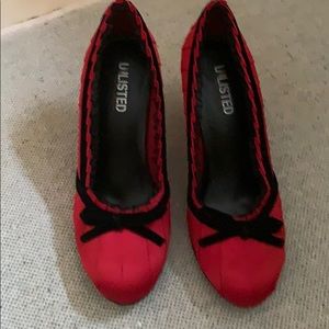 Red heels shoes about 3”.